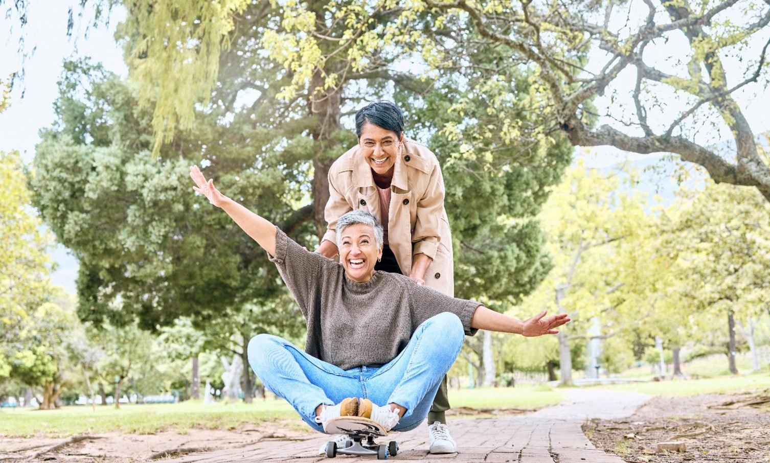 community_female-friendship_skating_50happy_landscape_web-aspect-ratio-1506-906