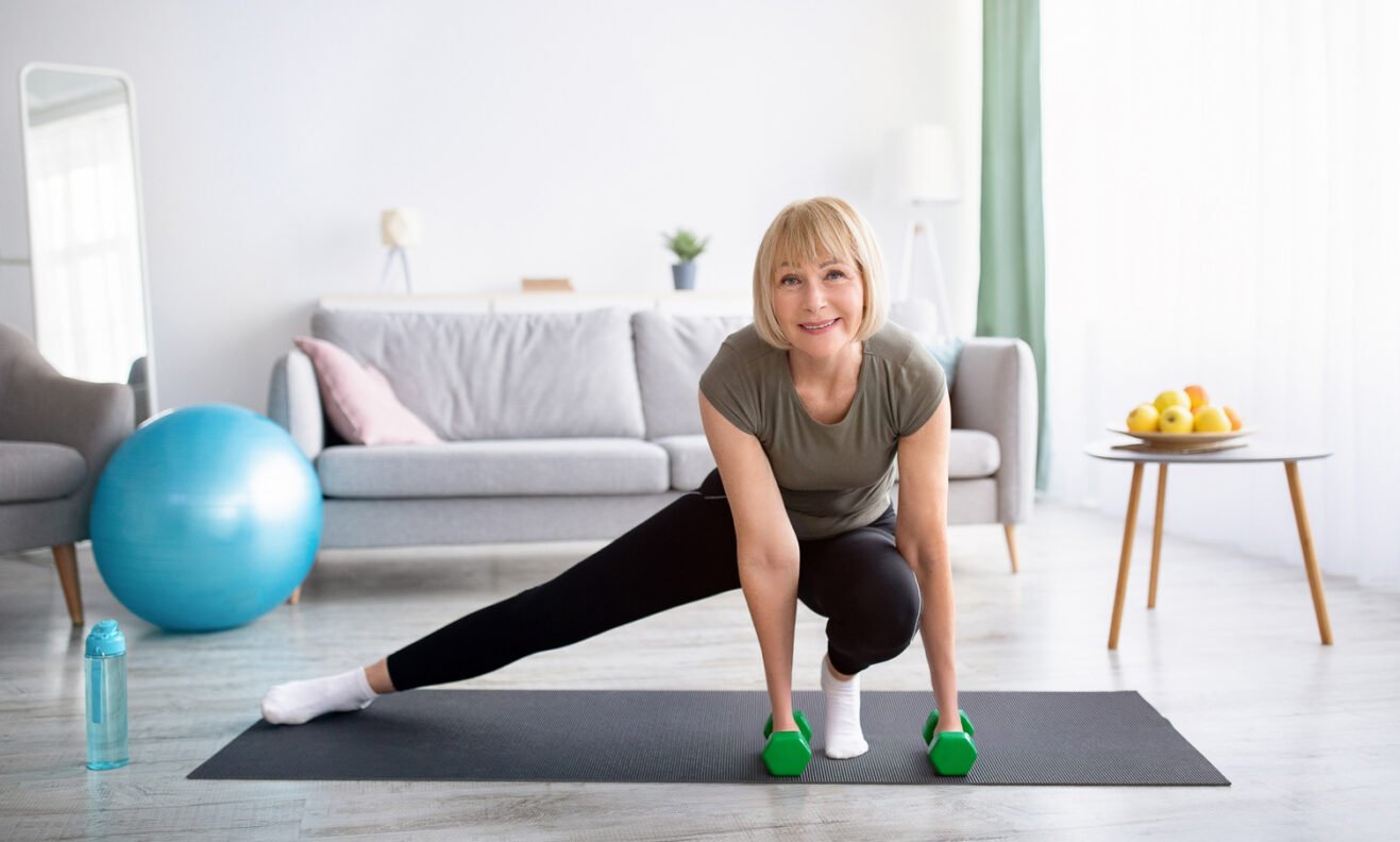 fitness_woman_45-50-happy_weights_landscape-web_2-aspect-ratio-1317-792