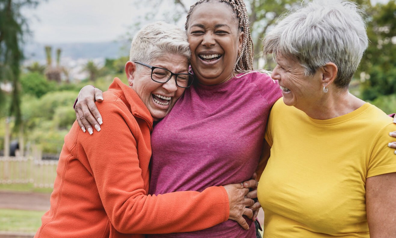 women_middle_age_interacial_laugh_fun_friends-aspect-ratio-1317-792